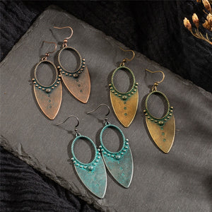 Beautiful Bohemian Tribal Drop Earrings. Available in Antique Gold, Bronzed, and Patina